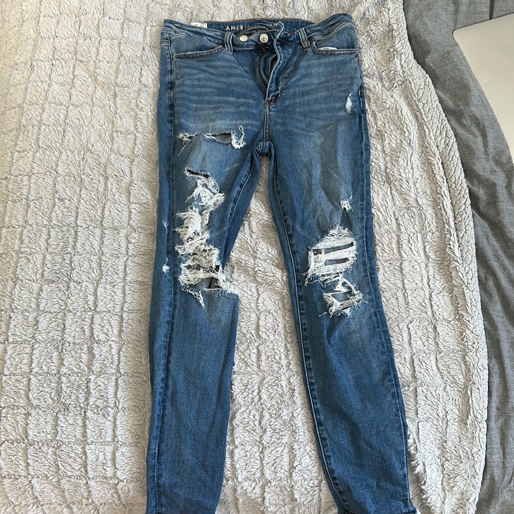dark wash extreme ripped jeans- AMERICAN EAGLE